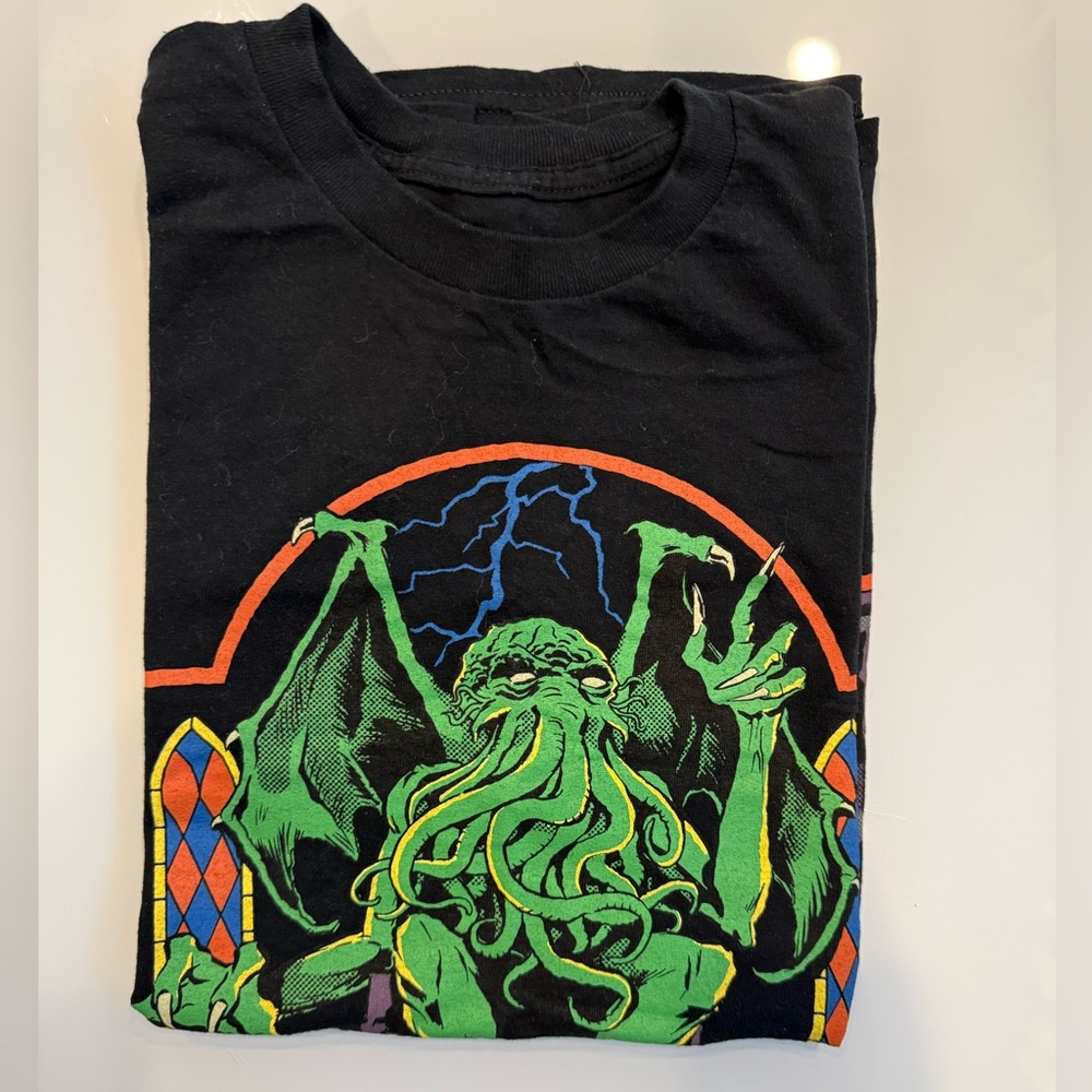 RHODES Graphic T-shirt with Green Cthulhu Print and Orange/Blue Accents